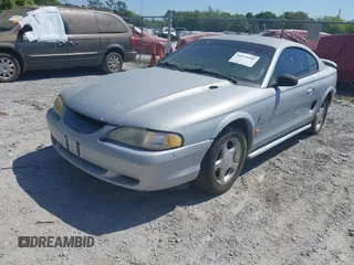 1995 Ford Mustang with VIN 1FALP4047SF170414, listed as a IAAI auction lot 42079990 with 106,398 mi miles. Bid and sale history available at carsss.com. Image 2.