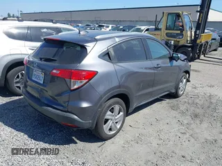 2019 Honda HR-V EX with VIN 3CZRU5H57KM726974, listed as a IAAI auction lot 41959748 with 62,065 mi miles. Bid and sale history available at carsss.com. Image 4.