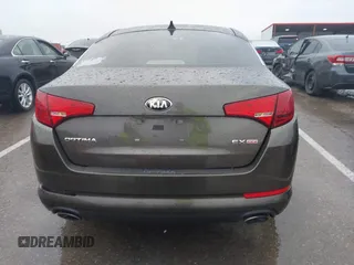 2013 Kia Optima EX z VIN 5XXGN4A79DG181719, wystawiony jako IAAI lot #42372478 z przebiegiem 166 410 mil mil oraz . Historia ofert i sprzedaży dostępna na DreamBid. Obrazek 16.