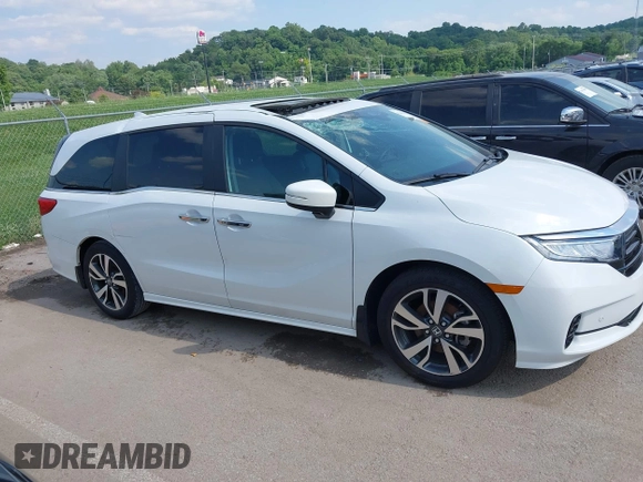 2023 Honda Odyssey Touring with VIN 5FNRL6H8XPB038875, listed as a IAAI auction lot 42441076 with 13,947 mi miles and . Bid and sale history available at DreamBid. Image 13.