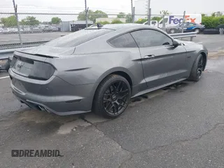 2021 Ford Mustang GT z VIN 1FA6P8CF0M5105060, wystawiony jako IAAI lot #41967671 z przebiegiem 27 626 mil mil oraz . Historia ofert i sprzedaży dostępna na DreamBid. Obrazek 4.