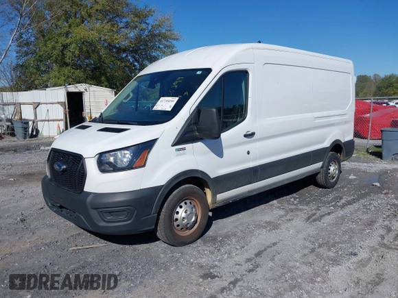 2023 Ford Transit Cargo with VIN 1FTBR2C8XPKA33372, listed as a IAAI auction lot 41735299 with 56,777 mi miles and . Bid and sale history available at DreamBid. Image 2.