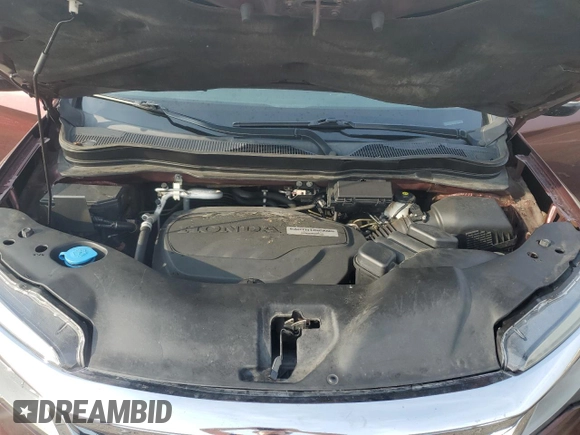 2020 Honda Pilot Touring 8-Passenger with VIN 5FNYF6H96LB028737, listed as a Copart auction lot 60435635 with 115,023 mi miles and Salvage title. Bid and sale history available at DreamBid. Image 12.
