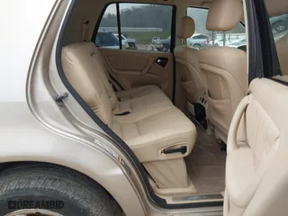 2002 Mercedes-Benz M-Class with VIN 4JGAB54E82A308902, listed as a IAAI auction lot 41779482 with 99,933 mi miles. Bid and sale history available at carsss.com. Image 8.