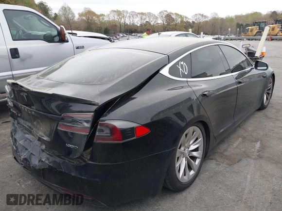 2018 Tesla Model S 75D with VIN 5YJSA1E24JF259874, listed as a IAAI auction lot 41921382 with 82,182 mi miles and . Bid and sale history available at DreamBid. Image 4.