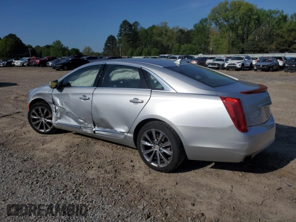 2013 Cadillac XTS Luxury with VIN 2G61P5S34D9100119, listed as a Copart auction lot 52525975 with 153,977 mi miles and Clean Title. Bid and sale history available at carsss.com. Image 2.