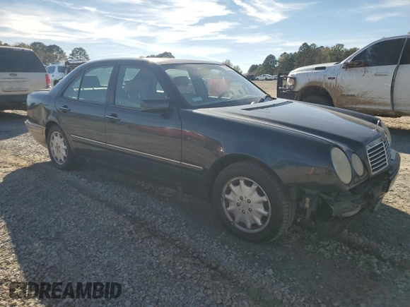 1998 Mercedes-Benz E 320 with VIN WDBJF25F3WA578364, listed as a Copart auction lot 77551834 with 228,913 mi miles and Salvage Title. Bid and sale history available at DreamBid. Image 4.