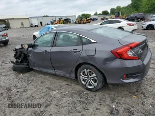 2017 Honda Civic LX z VIN 2HGFC2F56HH521264, wystawiony jako Copart lot #54561605 z przebiegiem 108 099 mil mil oraz Szkoda całkowita • Salvage title. Historia ofert i sprzedaży dostępna na DreamBid. Obrazek 2.