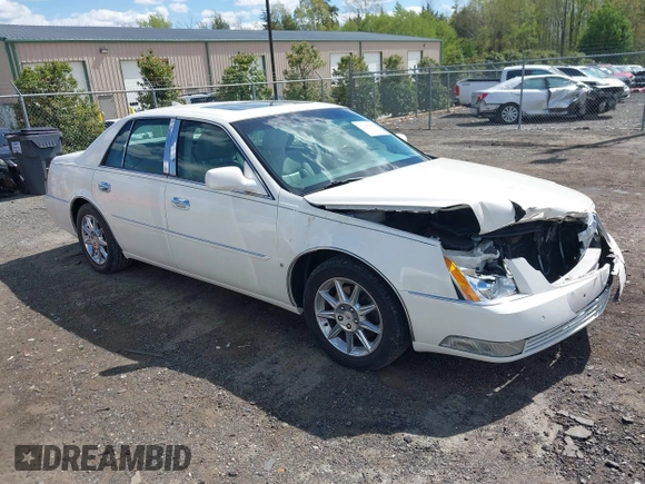 2010 Cadillac DTS 1SC z VIN 1G6KD5EY0AU114294, wystawiony jako IAAI lot #42046408 z przebiegiem 119 142 mil mil oraz . Historia ofert i sprzedaży dostępna na DreamBid. Obrazek 1.