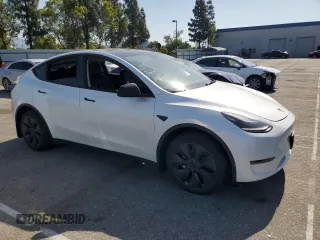 2024 Tesla Model Y с VIN 7SAYGDED6RF109727, выставлен на аукционе Copart как лот 59038725 с пробегом 14 948 миль миль и Списание • Salvage title. История ставок и продаж доступна на DreamBid. Изображение 4.