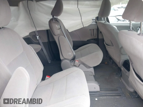 2015 Toyota Sienna LE AAS with VIN 5TDKK3DC1FS551231, listed as a IAAI auction lot 41991035 with 115,149 mi miles and . Bid and sale history available at DreamBid. Image 8.