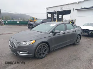 2018 Ford Fusion SE with VIN 3FA6P0H92JR258763, listed as a IAAI auction lot 42000848 with 101,344 mi miles and . Bid and sale history available at carsss.com. Image 2.