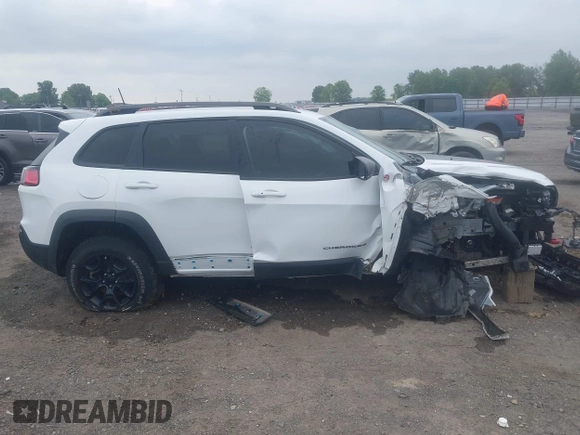 2021 Jeep Cherokee Trailhawk with VIN 1C4PJMBX4MD239112, listed as a IAAI auction lot 42271040 with 62,917 mi miles and . Bid and sale history available at DreamBid. Image 14.