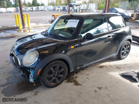 2010 MINI Cooper Hardtop with VIN WMWMF3C57ATZ65458, listed as a IAAI auction lot 41953118 with 106,047 mi miles. Bid and sale history available at carsss.com. Image 18.