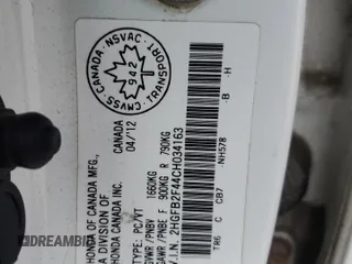 2012 Honda Civic z VIN 2HGFB2F44CH034163, wystawiony jako Copart lot #84198064 z przebiegiem 180 135 mil mil oraz Czysty tytuł • Clean title. Historia ofert i sprzedaży dostępna na DreamBid. Obrazek 13.