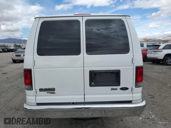 2012 Ford Econoline Passenger XL with VIN 1FBSS3BL9CDA44723, listed as a Copart auction lot 48371435 with 177,463 mi miles and Salvage Title. Bid and sale history available at DreamBid. Image 6.