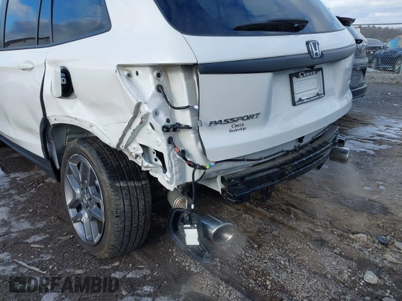 2023 Honda Passport EX-L with VIN 5FNYF8H50PB041370, listed as a IAAI auction lot 41536255 with 15,427 mi miles and . Bid and sale history available at carsss.com. Image 6.
