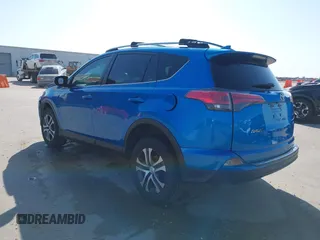 2017 Toyota RAV4 LE with VIN JTMZFREV4HJ115558, listed as a IAAI auction lot 41999381 with 94,223 mi miles and . Bid and sale history available at carsss.com. Image 3.