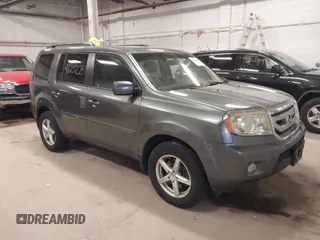 2011 Honda Pilot EX-L with VIN 5FNYF4H55BB039079, listed as a IAAI auction lot 42029278 with 173,216 mi miles. Bid and sale history available at carsss.com. Image 1.