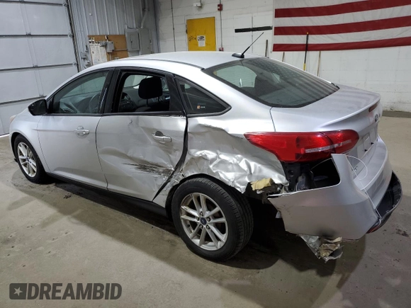 2015 Ford Focus SE with VIN 1FADP3F23FL282798, listed as a Copart auction lot 59588875 with 138,531 mi miles and Salvage title. Bid and sale history available at DreamBid. Image 2.