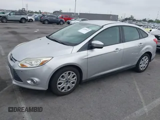 2012 Ford Focus SE with VIN 1FAHP3F27CL257447, listed as a IAAI auction lot 42180626 with 130,155 mi miles. Bid and sale history available at carsss.com. Image 2.