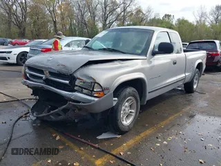 1998 Dodge Dakota SLT with VIN 1B7GL22Y5WS736756, listed as a IAAI auction lot 40687209 with 141,560 mi miles. Bid and sale history available at carsss.com. Image 19.