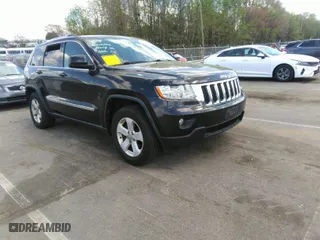 2011 Jeep Grand Cherokee Laredo with VIN 1J4RR4GTXBC538060, listed as a IAAI auction lot 41964694 with 152,999 mi miles. Bid and sale history available at carsss.com. Image 1.