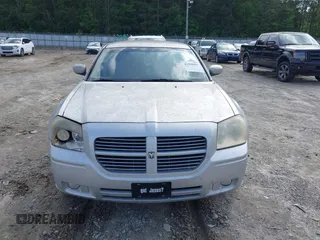 2007 Dodge Magnum z VIN 2D4FV47VX7H899799, wystawiony jako IAAI lot #42368907 z przebiegiem 209 558 mil mil oraz . Historia ofert i sprzedaży dostępna na DreamBid. Obrazek 6.