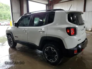 2015 Jeep Renegade Trailhawk with VIN ZACCJBCT8FPB78351, listed as a Copart auction lot 64036095 with 127,784 mi miles and Salvage title. Bid and sale history available at DreamBid. Image 2.