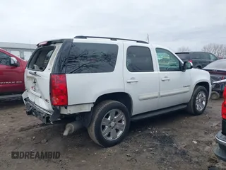 2007 GMC Yukon SLE with VIN 1GKFC13057R351385, listed as a IAAI auction lot 41720394 with 159,752 mi miles. Bid and sale history available at carsss.com. Image 14.