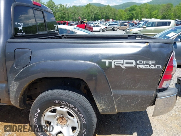 2014 Toyota Tacoma with VIN 5TFLU4ENXEX103129, listed as a IAAI auction lot 42230976 with 191,982 mi miles and . Bid and sale history available at DreamBid. Image 21.