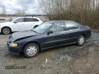 1995 Honda Accord with VIN JHMCD5532SC015391, listed as a Copart auction lot 48520095 with 192,359 mi miles and Salvage title. Bid and sale history available at DreamBid. Image 1.