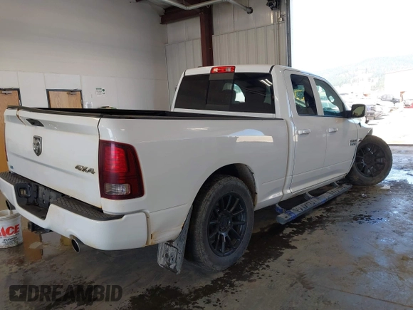 2014 Ram 1500 Sport with VIN 1C6RR7HT5ES367788, listed as a IAAI auction lot 42465965 with 102,578 mi miles and . Bid and sale history available at DreamBid. Image 4.