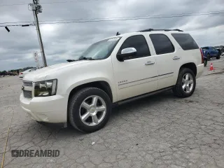 2011 Chevrolet Tahoe LTZ with VIN 1GNSCCE04BR393372, listed as a Copart auction lot 61757905 with 141,489 mi miles and Salvage title. Bid and sale history available at DreamBid. Image 1.