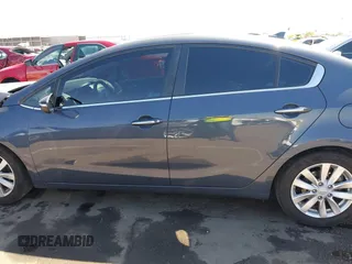 2014 Kia Forte EX with VIN KNAFX4A84E5112910, listed as a IAAI auction lot 42039761 with 118,126 mi miles. Bid and sale history available at carsss.com. Image 15.