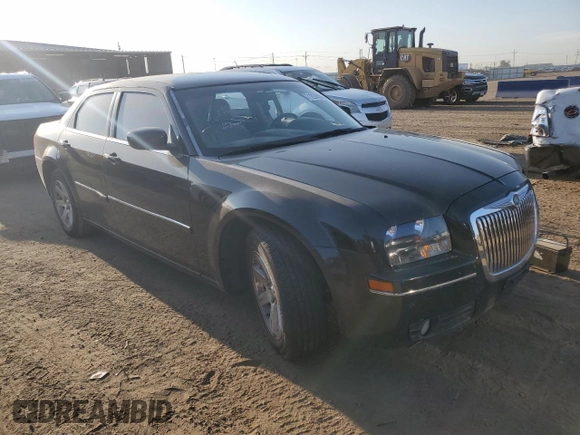 2006 Chrysler 300 Touring with VIN 2C3LA53G06H125654, listed as a Copart auction lot 71224414 with 145,759 mi miles and Salvage Title. Bid and sale history available at carsss.com. Image 4.