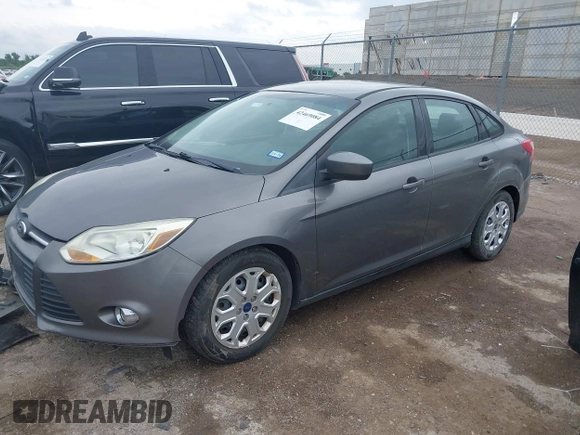 2012 Ford Focus SE z VIN 1FAHP3F2XCL430734, wystawiony jako IAAI lot #42469084 z przebiegiem 128 168 mil mil oraz . Historia ofert i sprzedaży dostępna na DreamBid. Obrazek 2.