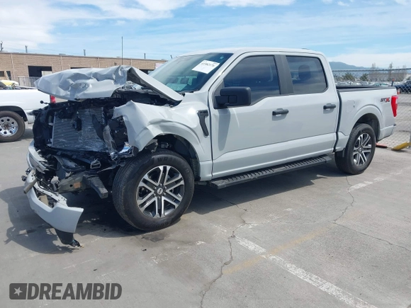2023 Ford F-150 XL with VIN 1FTEW1CP2PKE60004, listed as a IAAI auction lot 41982176 with 17,900 mi miles and . Bid and sale history available at DreamBid. Image 2.