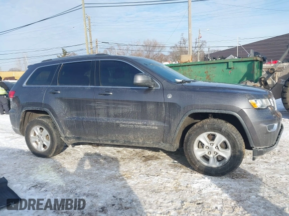 2017 Jeep Grand Cherokee Laredo with VIN 1C4RJFAG7HC876531, listed as a IAAI auction lot 41354471 with 129,056 mi miles. Bid and sale history available at carsss.com. Image 12.