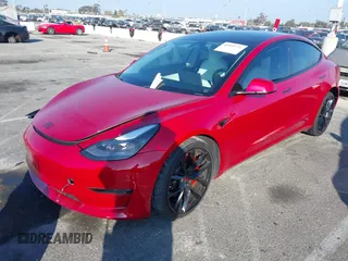 2021 Tesla Model 3 Performance with VIN 5YJ3E1EC9MF926301, listed as a IAAI auction lot 40959721 with 28,094 mi miles and . Bid and sale history available at DreamBid. Image 19.