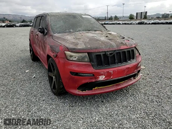 2012 Jeep Grand Cherokee SRT8 with VIN 1C4RJFDJ7CC217641, listed as a Copart auction lot 44060105 with 108,858 mi miles and Salvage Title. Bid and sale history available at carsss.com. Image 12.
