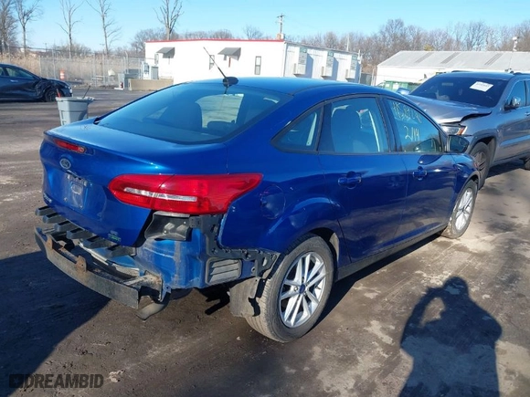 2018 Ford Focus SE with VIN 1FADP3FEXJL202237, listed as a IAAI auction lot 41589240 with 107,395 mi miles. Bid and sale history available at carsss.com. Image 4.