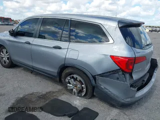 2016 Honda Pilot LX with VIN 5FNYF6H1XGB099987, listed as a IAAI auction lot 41556979 with 98,373 mi miles. Bid and sale history available at carsss.com. Image 3.