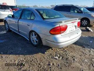 2004 Oldsmobile Alero GL1 z VIN 1G3NL52E94C189058, wystawiony jako IAAI lot #41224615 z przebiegiem 208 921 mil mil oraz . Historia ofert i sprzedaży dostępna na DreamBid. Obrazek 3.