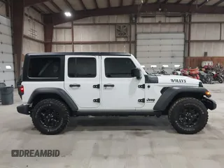 2023 Jeep Wrangler Sport S with VIN 1C4HJXDN2PW632584, listed as a IAAI auction lot 41965191 with 20,288 mi miles and . Bid and sale history available at DreamBid. Image 14.