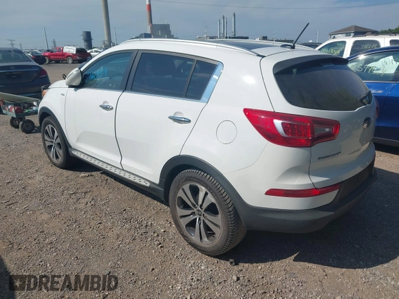 2013 Kia Sportage EX with VIN KNDPCCA22D7363985, listed as a IAAI auction lot 42621519 with 160,029 mi miles and . Bid and sale history available at DreamBid. Image 3.