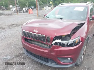 2019 Jeep Cherokee Latitude Plus with VIN 1C4PJMLB3KD195412, listed as a IAAI auction lot 42117860 with 177,178 mi miles. Bid and sale history available at carsss.com. Image 6.