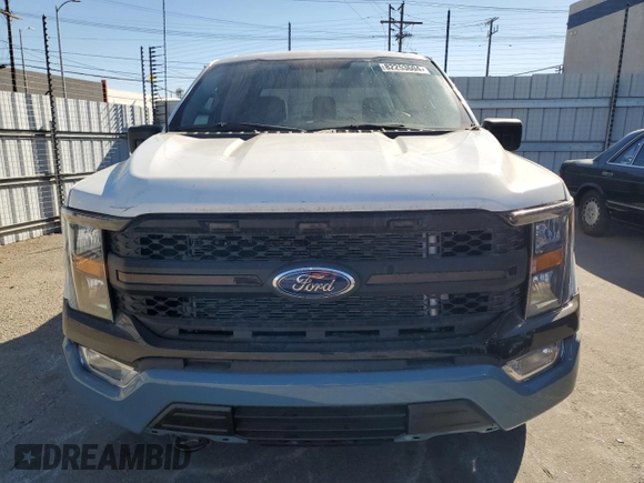 2022 Ford F-150 XL with VIN 1FTEW1EB9NKE67725, listed as a Copart auction lot 82253604 with 14,760 mi miles and Salvage Title. Bid and sale history available at carsss.com. Image 5.