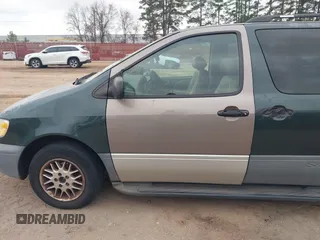 1999 Toyota Sienna LE with VIN 4T3ZF13C1XU098026, listed as a IAAI auction lot 41514367 with 314,638 mi miles. Bid and sale history available at carsss.com. Image 6.