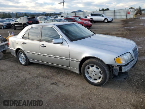 2000 Mercedes-Benz C 230 Kompressor with VIN WDBHA24GXYA802790, listed as a Copart auction lot 87460324 with 156,593 mi miles and Salvage Title. Bid and sale history available at carsss.com. Image 4.